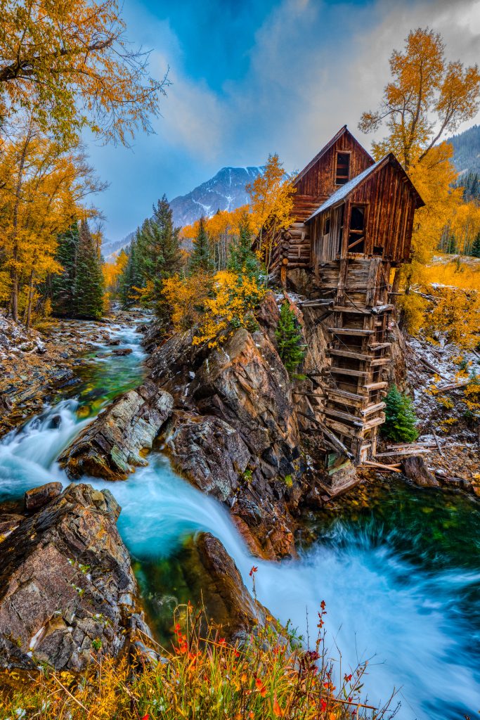 5DM40218 Crystal Mill next to Crystal River in Colorado with fall foliage