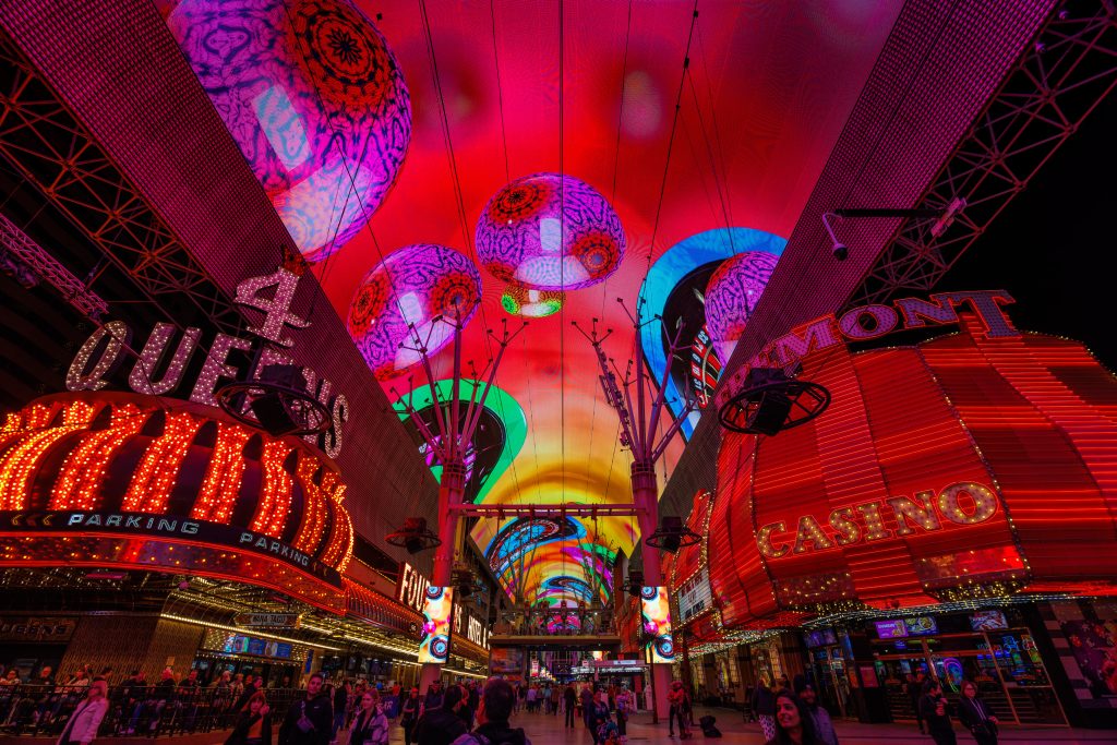 R5__3299 Photo looking up at video wall on roof with partners below at Fremont Street Experience in Las Vegas